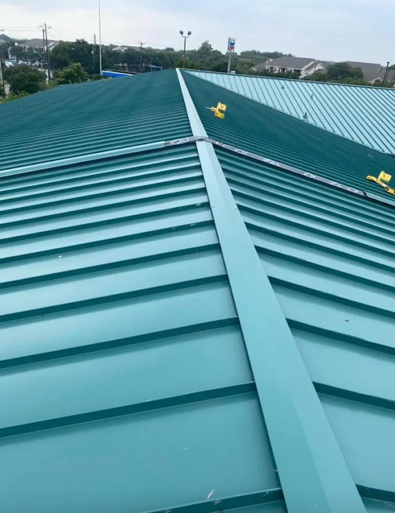 Green commercial metal roof ridge and valley for Metal Roof Repair in Montebello